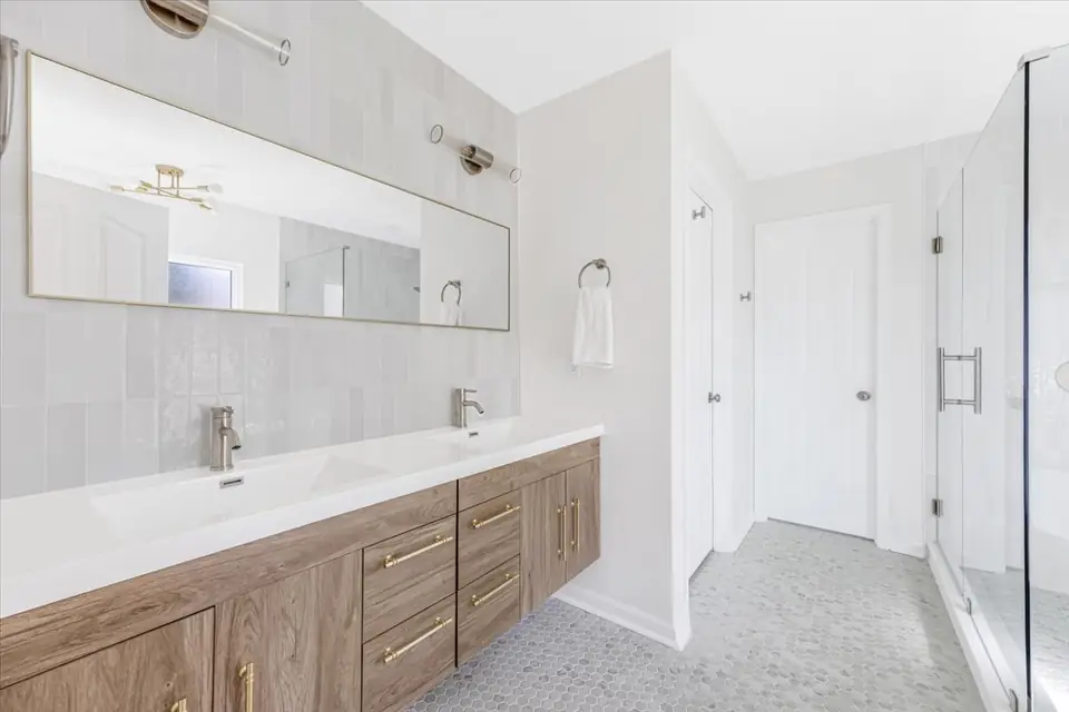 Inside Sutton Park Bathroom Remodels, designed by Zen Reno & Design in Jacksonville, FL