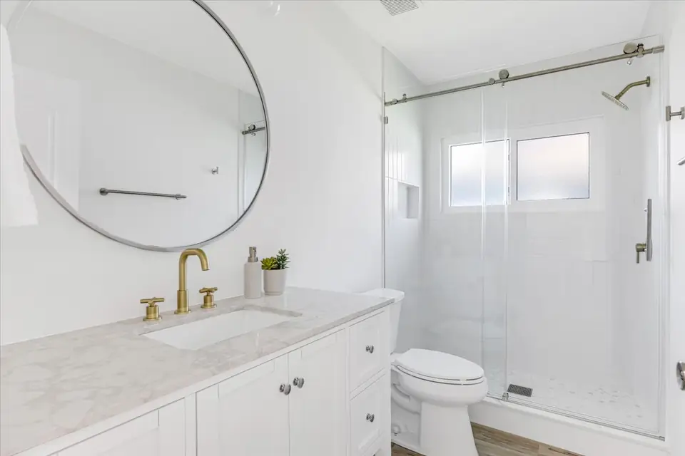 Within Sutton Park Bathroom Remodels, designed by Zen Reno & Design in Jacksonville, FL