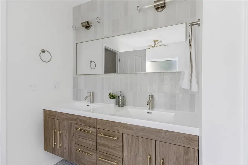 A view of Sutton Park Bathroom Remodels, designed by Zen Reno & Design in Jacksonville, FL